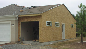 An extra garage being added to a home